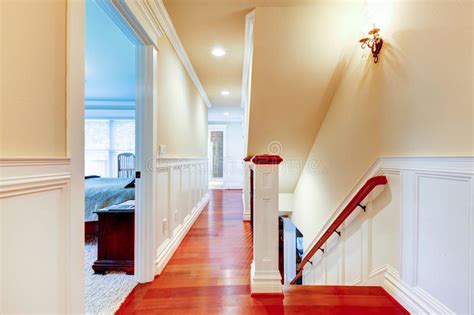 Luxury House Interior Upstairs Hallway With Staircase Stock Photo