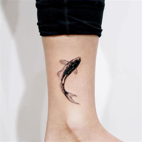 The black koi is a symbol of masculinity that may represent a dragon koi tattoo incorporates an asian dragon and a koi fish. Mythical Koi Fish Tattoos - Symbol of Overcoming Adversity
