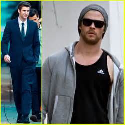 This chris hemsworth photo contains sunglasses, dark glasses, and shades. Liam Hemsworth Suits Up, Chris Hemsworth Hits the Gym ...