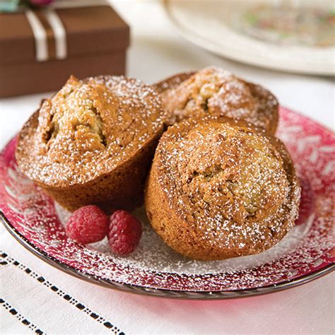 In another large bowl, combine the bananas, butter, yogurt, vanilla extract and eggs whisking until smooth. Banana Nut Muffins - Paula Deen Magazine