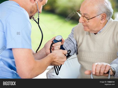 Male Nurse Checking Image And Photo Free Trial Bigstock