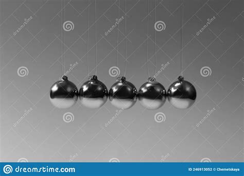 Newton S Cradle On Grey Background Physics Law Of Energy Conservation