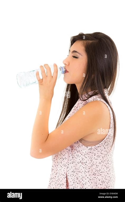 Beautiful Young Girl Drinking Water From A Plastic Bottle Stock Photo