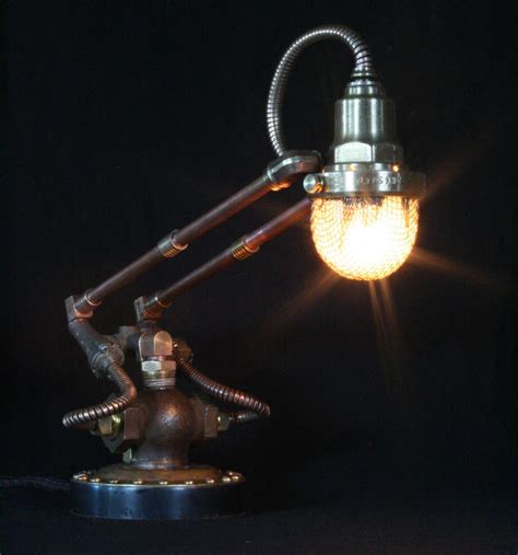 Steam punk lamp | Lighting and Ceiling Fans Steampunk industrial machine age lamp an excellent addition to the perfect man cave, this incredible industrial style table lamp is sure to make a statement in any room!