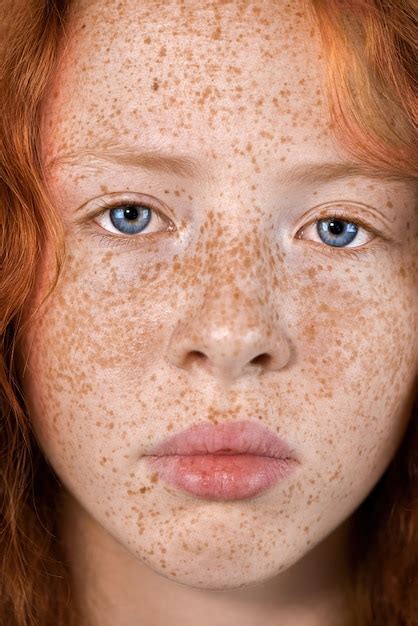 Premium Photo Portrait Of A Red Haired Girl With Lots Of Freckles On The Skin And Blue Eyes On