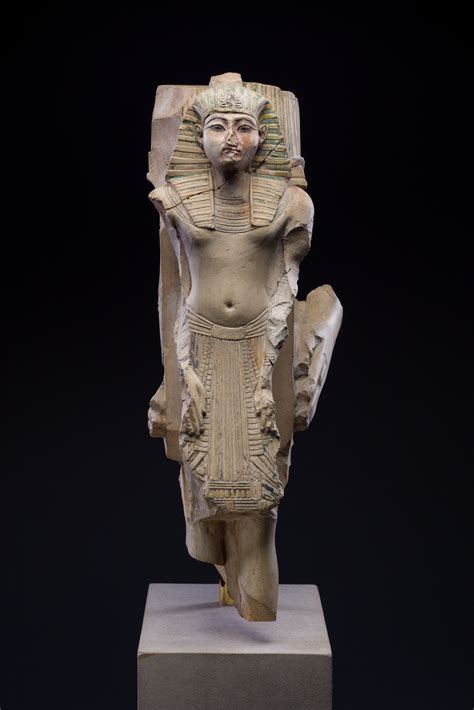 Figure Of A King As Part Of A Group Proffered By An Official Of