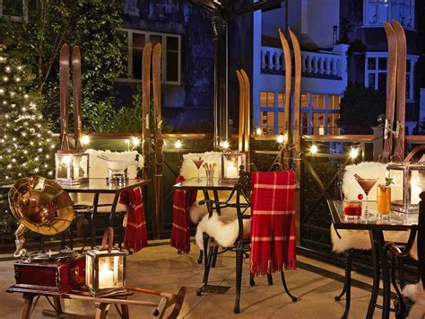 Hike through a forest of rustic cabin decor featuring pine cones and acorns, mallard ducks, bears, moose, deer, bass, & trout. Ski bars in London: Alpine, ski-themed drinking spots