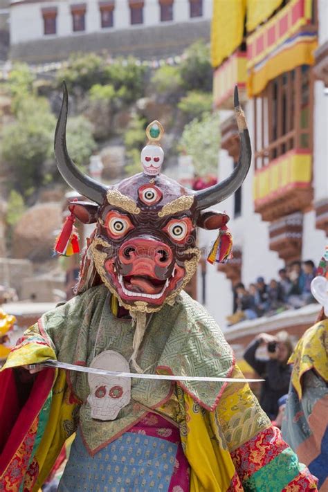 Tibetan Buddhist Lamas In The Mystical Masks Perform A Ritual Tsam