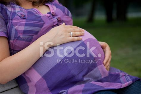 Pregnant Woman Hugs Her Belly Stock Photo Royalty Free Freeimages