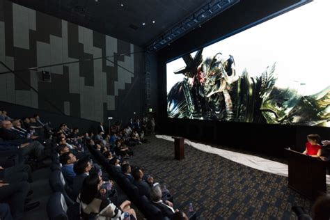 Young man and woman are shocked by what is happening on screen in movie. Inside Look Samsung's Cinema LED Screen: A Next ...