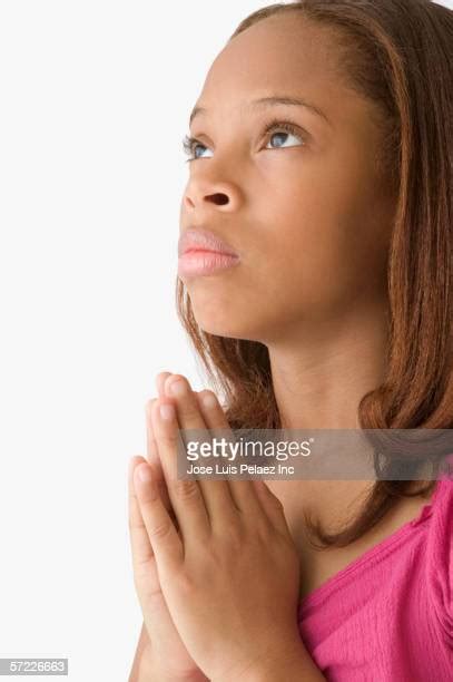 African American Girl Praying Photos And Premium High Res Pictures