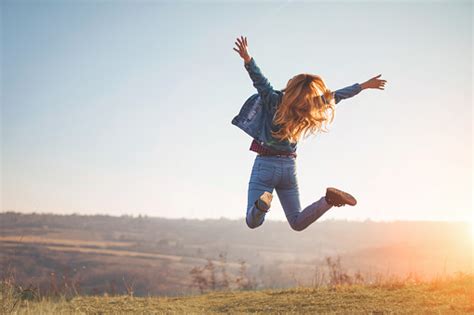 Happy Jump By Girl In Nature Stock Photo Download Image Now Istock