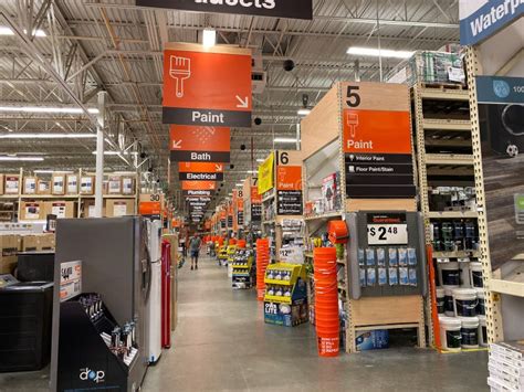 The Department Signs Hanging From The Ceiling At Home Depot Home