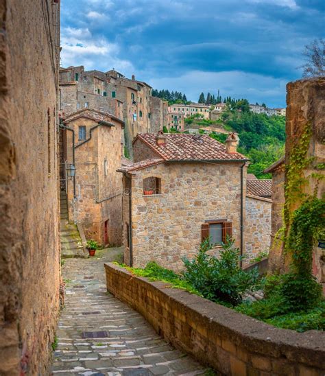 Beautiful Evening Street In The Old Medieval Town In Tuscany Stock