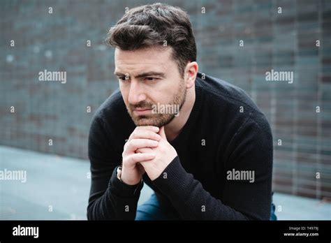 Desperate Man Lost In Depression Suffering Emotional Pain Stock Photo