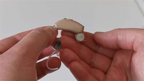 Open the battery door when the hearing aid. How to turn your hearing aids on and off - YouTube