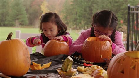 Kids Carving Pumpkins Halloween Stock Footage Video 100 Royalty Free