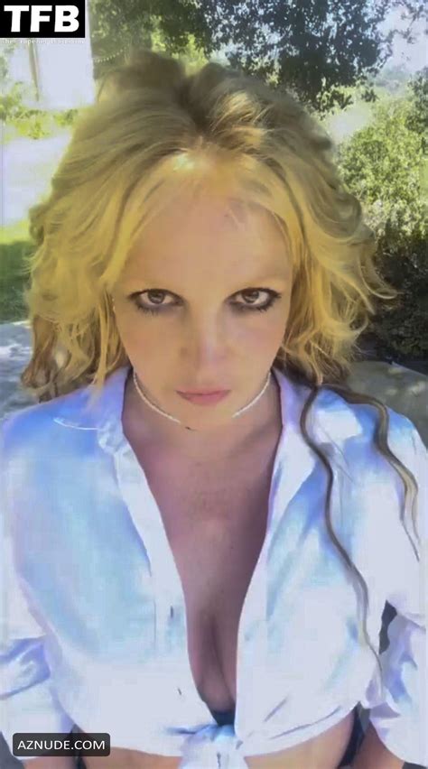 britney spears sexy poses showing off her hot cleavage in a white top on social media aznude