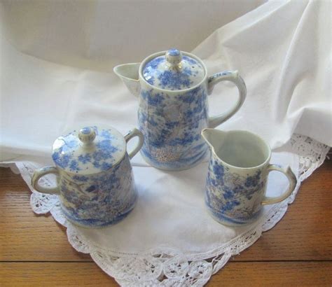 Maybe you would like to learn more about one of these? Blue and White Porcelain Tea Set Hand Painted Gold Overlay ...
