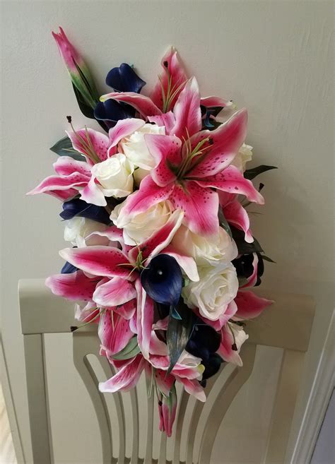 Stargazer Lilies And Roses Wedding Bouquets Pink Roses And Stargazer