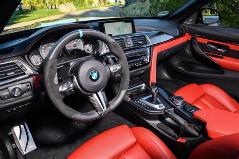 Nothing much has changed from the normal m4, you still get the carbon fibre and leather. 2019 BMW M4 Convertible Interior Photos | CarBuzz