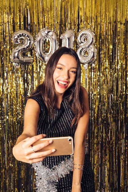 Free Photo Party Girl Taking Selfie On New Year Celebration