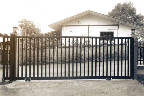Large Steel Fence Door At The Front Of The House Is Strong Durable And