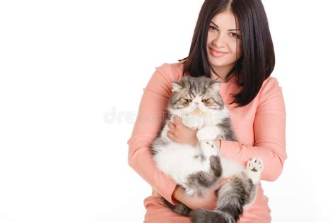 Beautiful Smiling Brunette Girl And Her Big Cat On A White Background