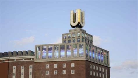 By the main railway station is a distinctive tower with a golden u on the roof. Dortmunder U - Zentrum für Kunst und Kreativität ...
