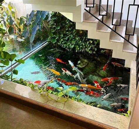 A Fish Pond In The Middle Of Stairs