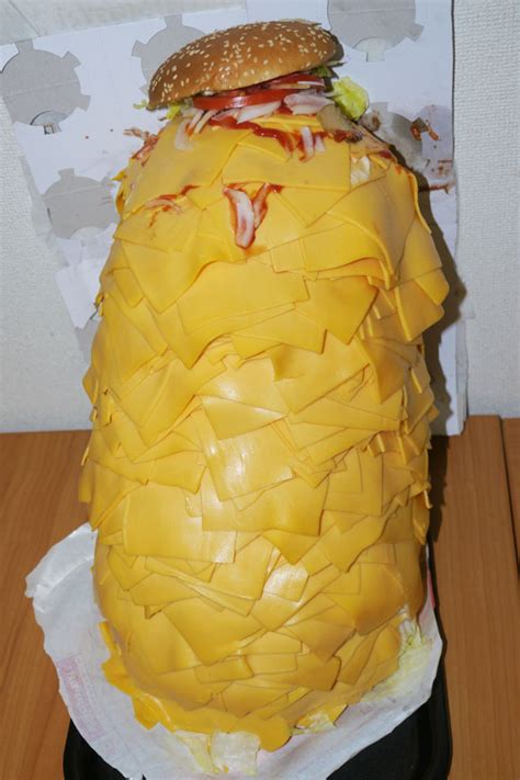 news whopper with 1 000 slices of cheese man creates crazy concoction from burger king japan