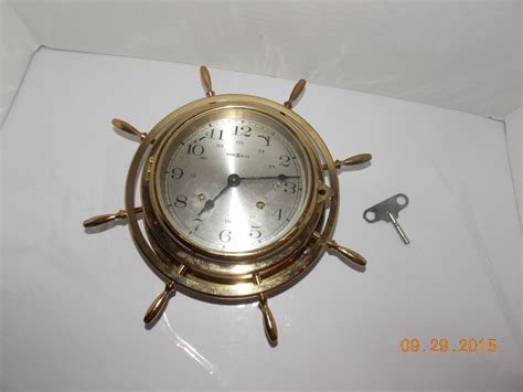 Vintage Howard Miller Midcentury Brass Nautical Ship Wheel Wall Clock