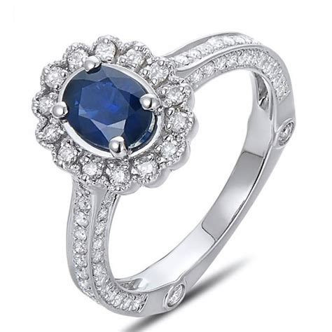 You don't have to spend a lot to get a beautiful engagement ring. Sale Antique Floral 1 Carat Blue Sapphire and Diamond Engagement Ring for Her in White Gold ...