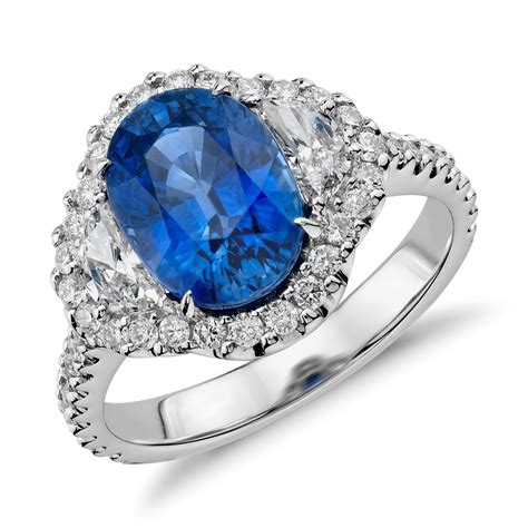 Blue Sapphire And Diamond Halo Three Stone Ring In 18k White Gold 386