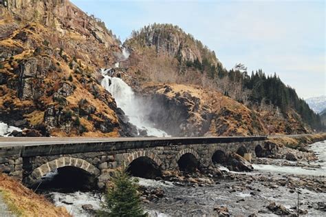 Latefossen Waterfall Odda Norway With The Stone Road Bridge Across In