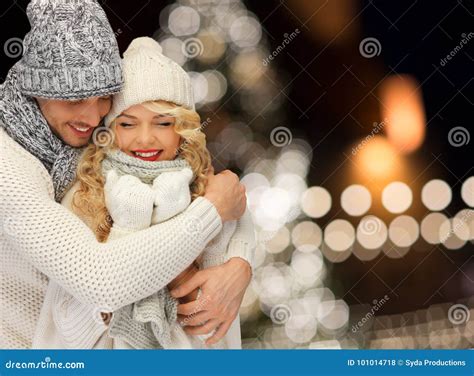 Happy Couple Hugging Over Christmas Lights Stock Photo Image Of Love