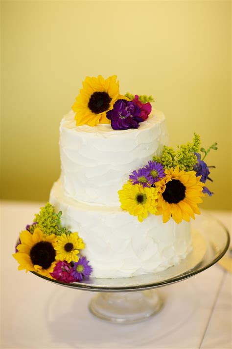 Yellow And Purple Flower Decorated Wedding Cake
