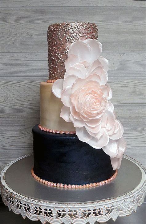 Rose gold and burgundy bouquet. Blush, navy and rose gold wedding cake - decorated with ...