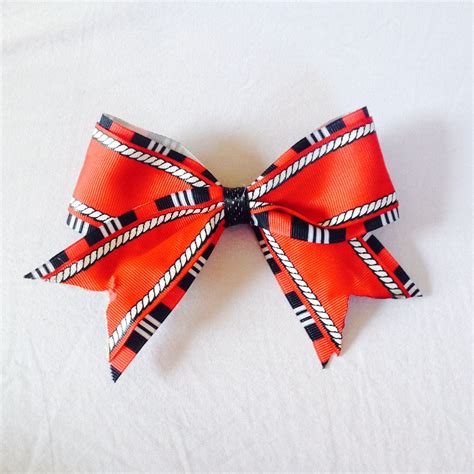 I also used this cheer bow chevron i found on the silhouette design store and paid $0.99 for. DIY Cheer Bow. (With images) | Cheer bows diy, Cheer bows, Bows
