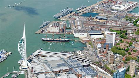 A contrast between old and new: HMNB Portsmouth and the historic dockyard [2048x1152] : WarshipPorn