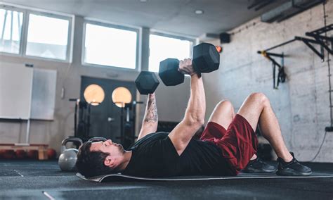 14 Dumbbell Floor Exercises You Can Do While Lying Down