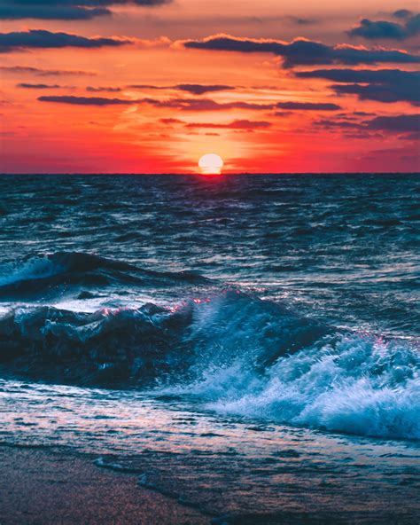 Photo Of Ocean During Sunset · Free Stock Photo