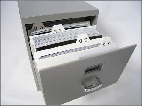 Our file cabinet has drawer pulls, buttons, and file card slots on the outside. File Separators For Filing Cabinets • Cabinet Ideas