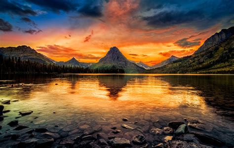 Landscape Silhouette Photography Of Mountain Behind Calm Body Of Water