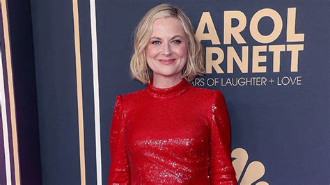 Amy Poehler Wears Baywatch Red Bathing Suit While Splashing In The