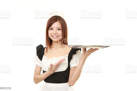 Japanese Woman Wearing French Maid Costume Presenting And Showing