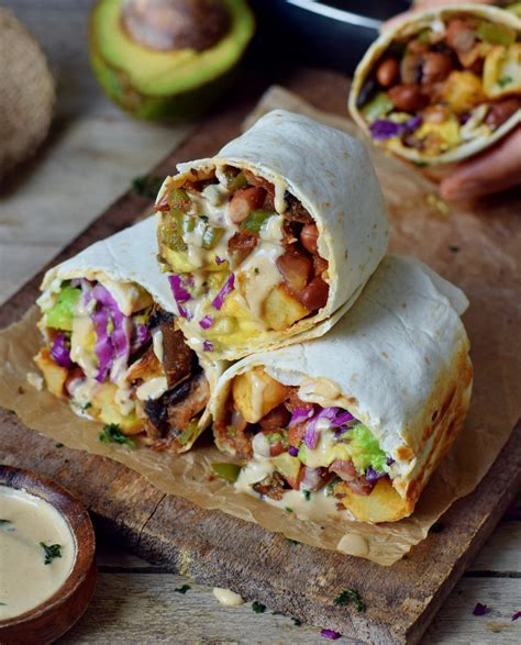 these vegan breakfast burritos are loaded with roasted potatoes avocado mushrooms and peppers