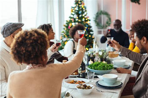 Family Christmas Lunch At Home By Stocksy Contributor BONNINSTUDIO Stocksy