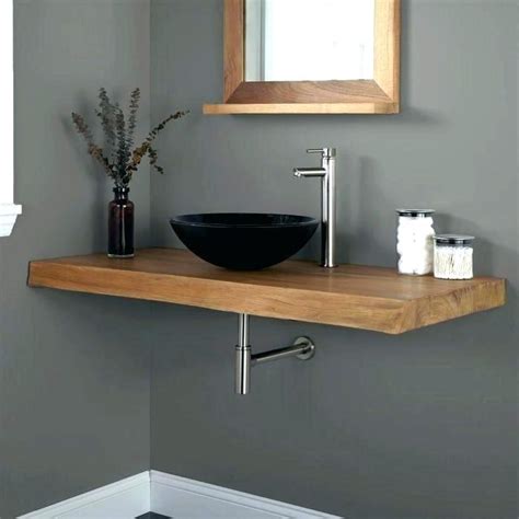 Floating bathroom vanity ideas are a growing bathroom design trend that helps reduce the visual weight of the bathroom vanity and sink. floating shelf vanity floating makeup vanity shelf ...