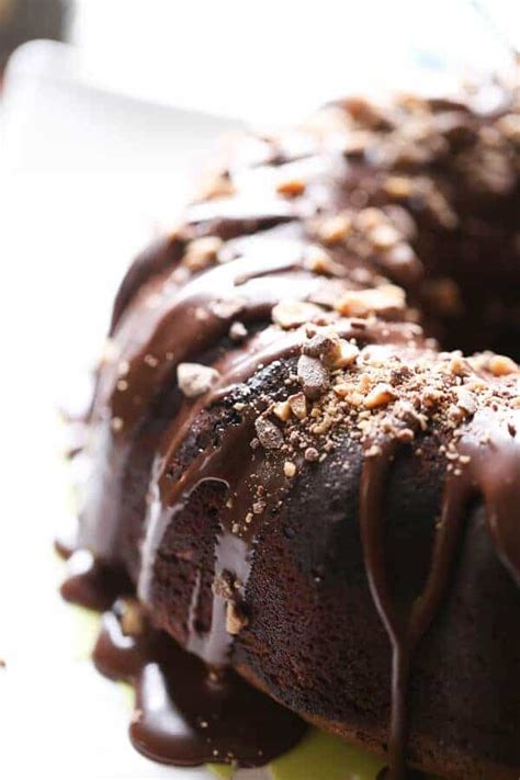 A chocolate gingerbread bundt cake which is perfect at any time of the year, and especially at christmas with a special christmas tree bundt pan. Guinness Chocolate Bundt Cake - LemonsforLulu.com